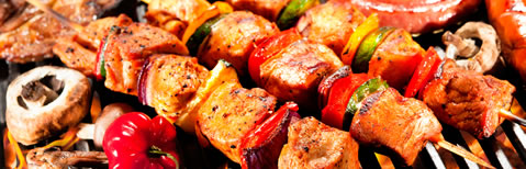 Barbecued meats and vegetables